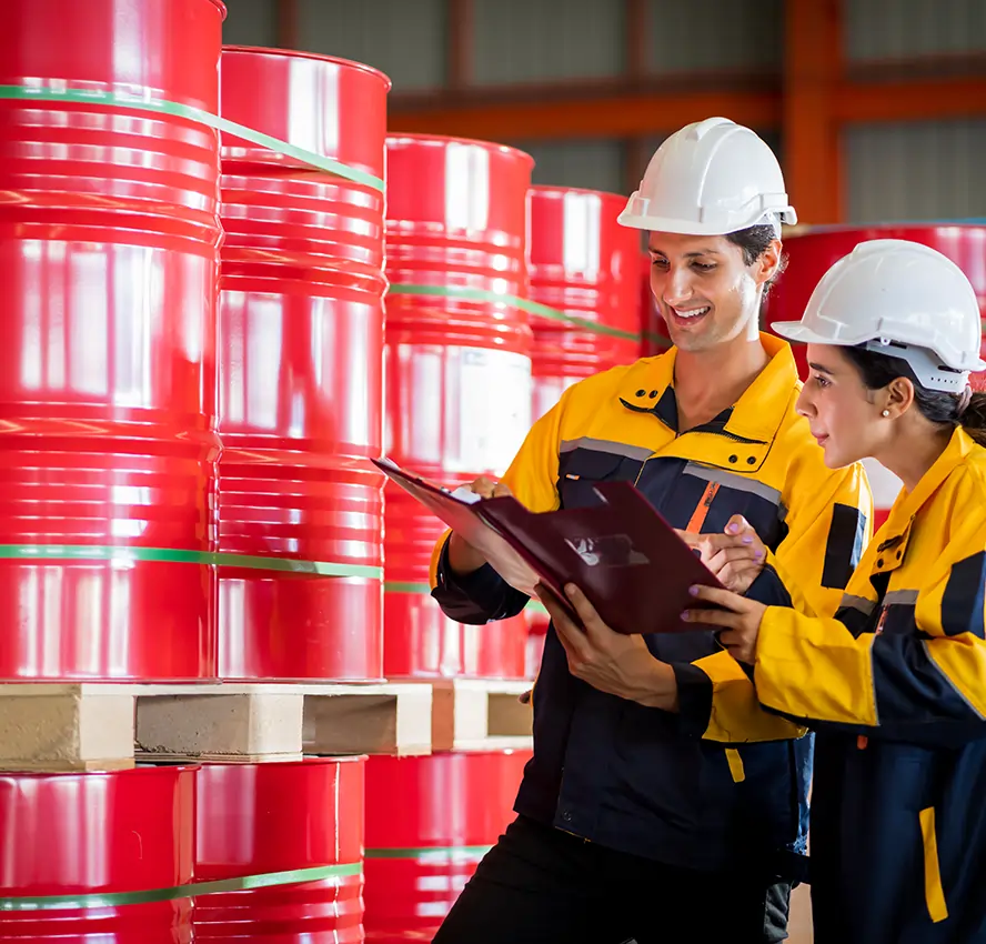 Warehouse rows of chemical drums and storage containers